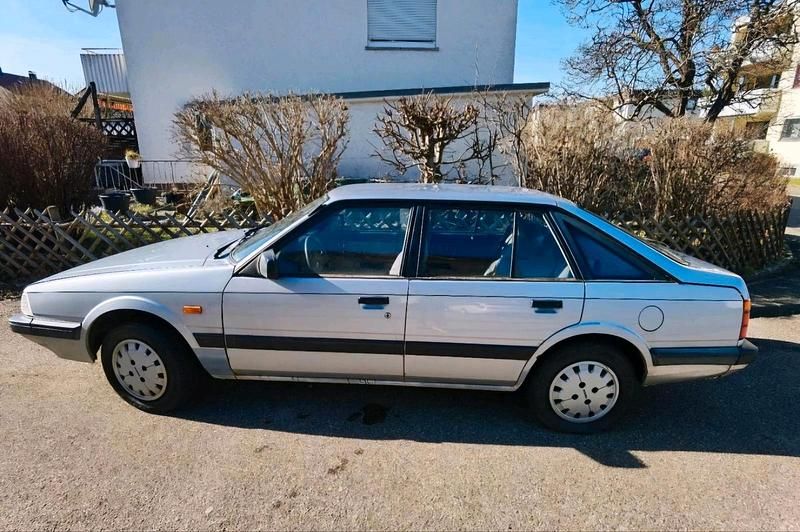 Silber Gebraucht 1987 Mazda 626 Limousine | 9.999 € - Bild 1/4