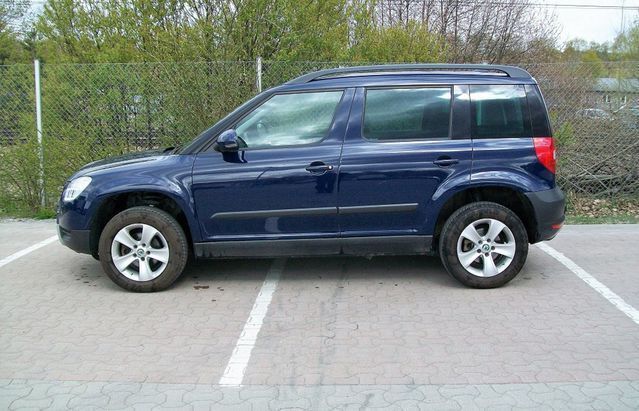 Gebraucht Skoda Yeti Business Line 110 PS (80 kW) 2013 Blau metallic SUV