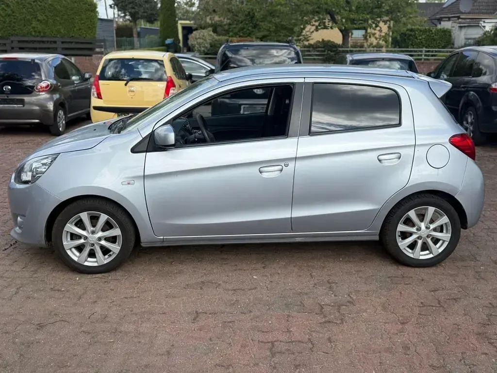 Gebraucht Mitsubishi Space Star 80 PS (58 kW) 2013 Silber Van / Kleinbus