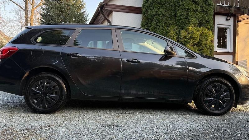 Gebraucht Opel Astra Edition 120 PS (88 kW) 2012 Schwarz Kombi