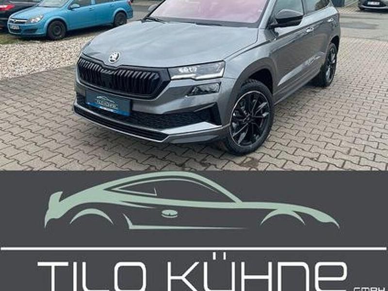 Grau Gebraucht 2024 Skoda Karoq SportLine SUV | 33.990 € (Fairer Preis) - Bild 1/4