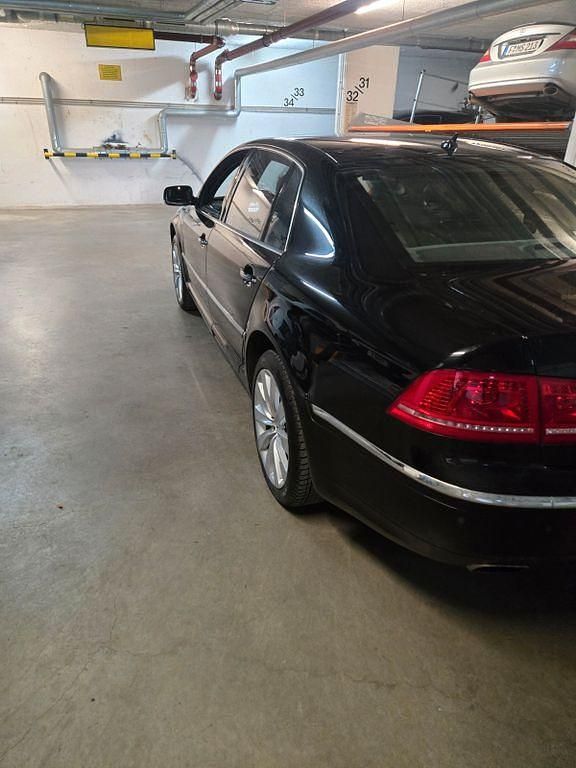 Second-hand VW Phaeton 334 CP (245 kW) 2012 Negru Berlinǎ