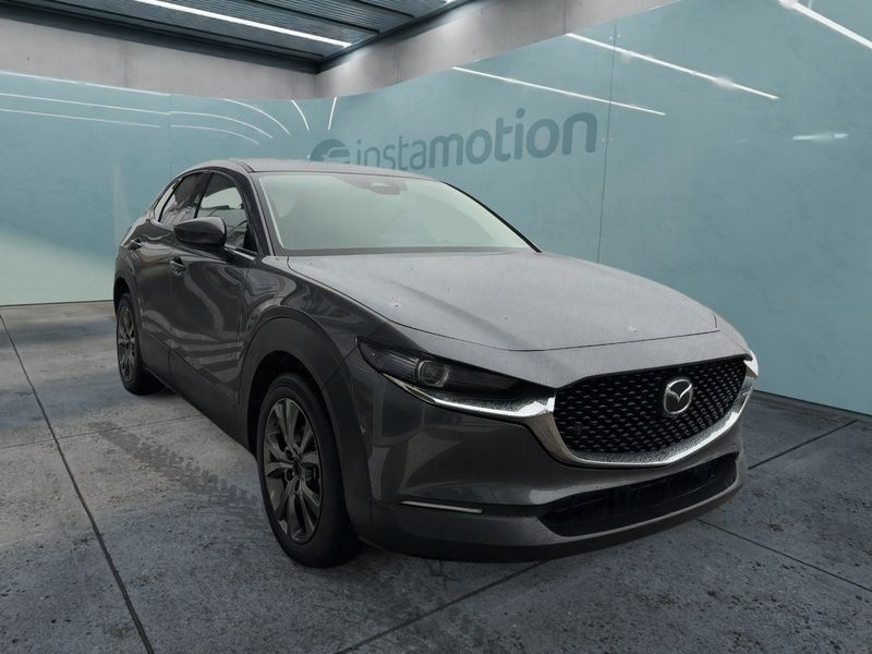 Grau Gebraucht 2024 Mazda CX-30 Exclusive-Line SUV | 34.840 € (Teuer) - Bild 1/4