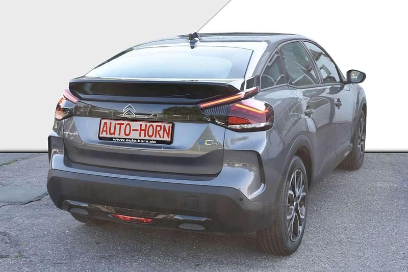 Gebraucht Citroën e-C4 100 kW (136 PS) 2024 Platinumgrau metallic Limousine