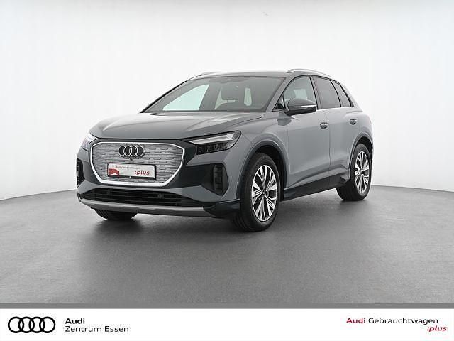 Grau Gebraucht 2022 Audi Q4 e-tron Advanced SUV | 27.480 € (Superpreis) - Bild 1/3