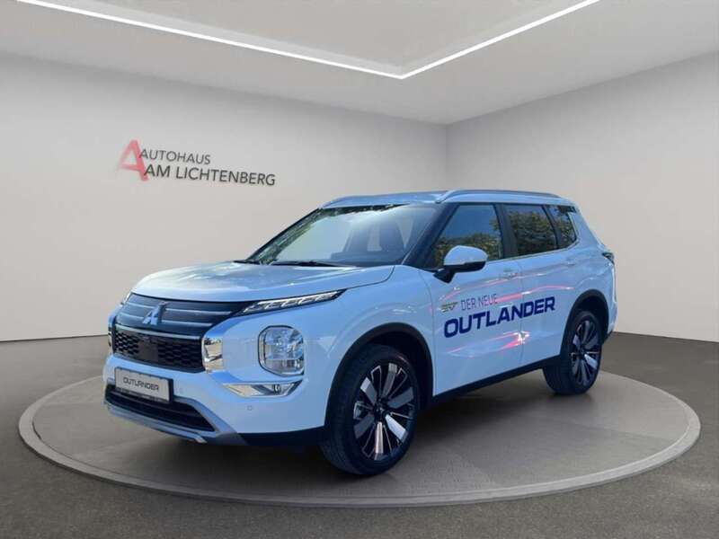 Weiss Neu 2025 Mitsubishi Outlander P-HEV Edition SUV | 51.930 € - Bild 1/4