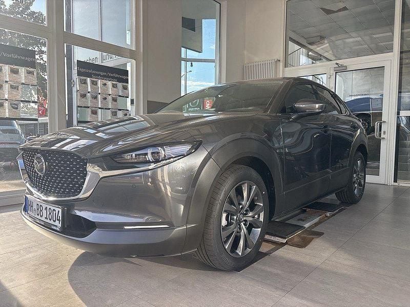 Machine gray Neu 2025 Mazda CX-30 Exclusive-Line SUV | 32.950 € - Bild 1/4