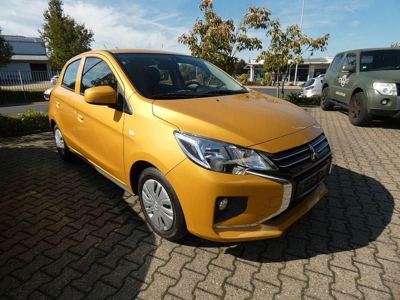 Gelb Gebraucht 2021 Mitsubishi Space Star Spirit Limousine | 9.950 € (Fairer Preis) - Bild 1/4