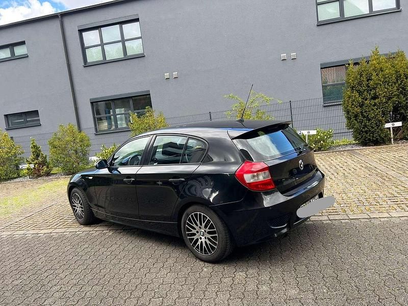 Second-hand BMW 116 109 CP (80 kW) 2006 Negru Hatchback