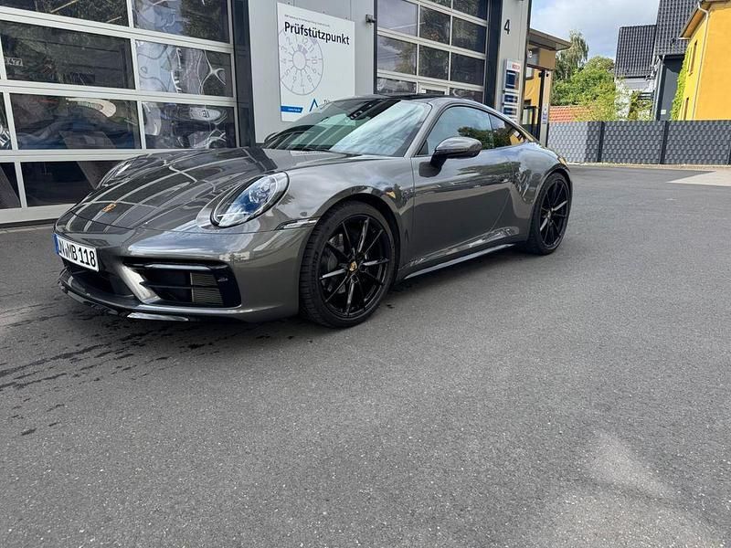 Grau Gebraucht 2023 Porsche 911 Carrera Coupé | 137.500 € - Bild 1/4