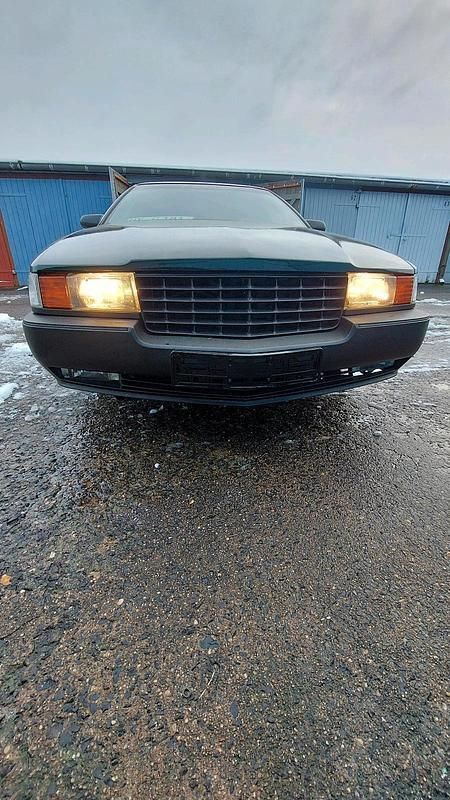 Grün Gebraucht 1994 Cadillac Seville STS Limousine | 3.500 € - Bild 1/4