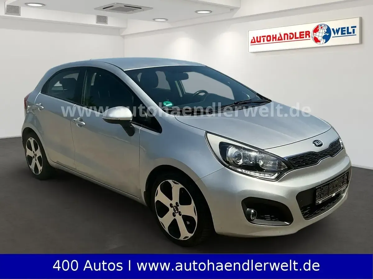 Gebraucht Kia Rio 90 PS (66 kW) 2013 Silber Kleinwagen