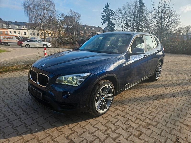 Blau Gebraucht 2015 BMW X1 Sport Line SUV | 13.999 € (Superpreis) - Bild 1/4