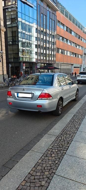 Gebraucht Mitsubishi Lancer Invite 98 PS (72 kW) 2005 Silber Kombi