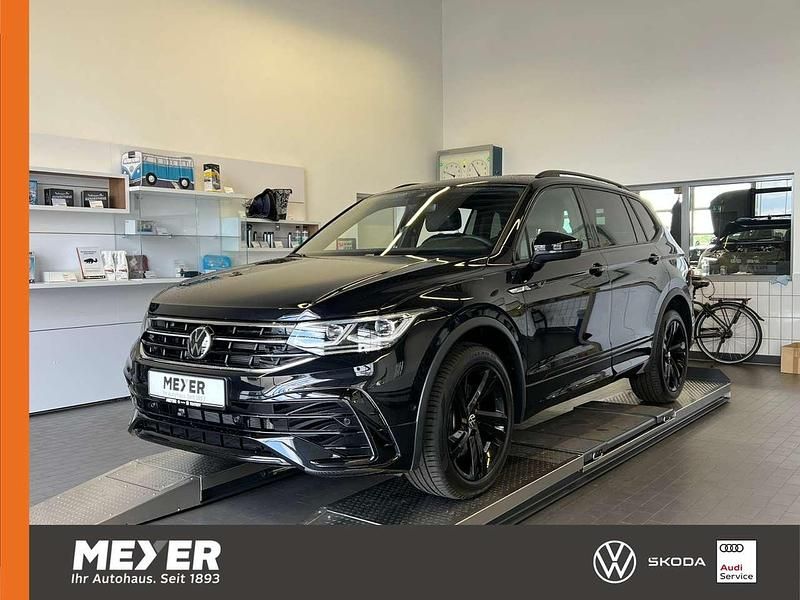 Deep black perleffekt Gebraucht 2024 VW Tiguan Allspace R-line SUV | 46.690 € (Teuer) - Bild 1/4