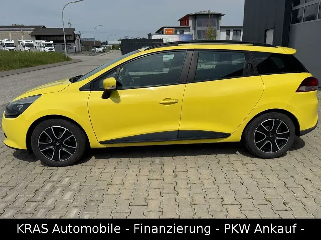 Używany Renault Clio IV Expression 90 KM (66 kW) 2013 Żółty Sedan/Limuzyna