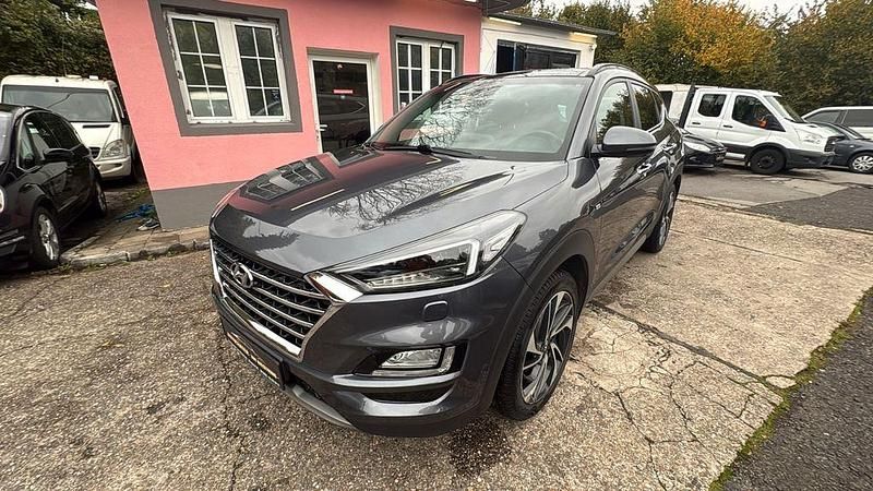Grau Gebraucht 2019 Hyundai Tucson Premium SUV | 19.490 € (Fairer Preis) - Bild 1/4