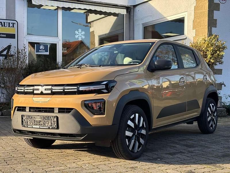 Safaribeige Gebraucht 2024 Dacia Spring Expression Kleinwagen | 17.490 € (Fairer Preis) - Bild 1/4