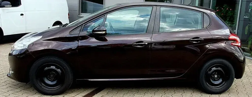 Gebraucht Peugeot 208 Active 82 PS (60 kW) 2013 Schwarz Kleinwagen