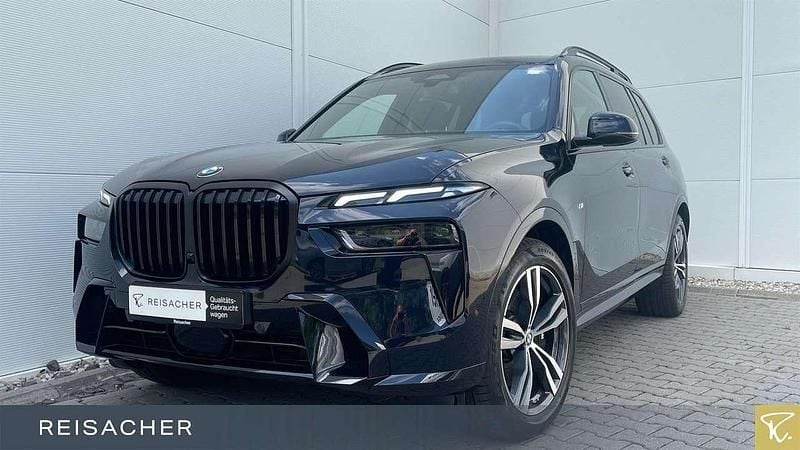 Carbonschwarz metallic Gebraucht 2024 BMW X7 M Sport SUV | 79.999 € (Superpreis) - Bild 1/4