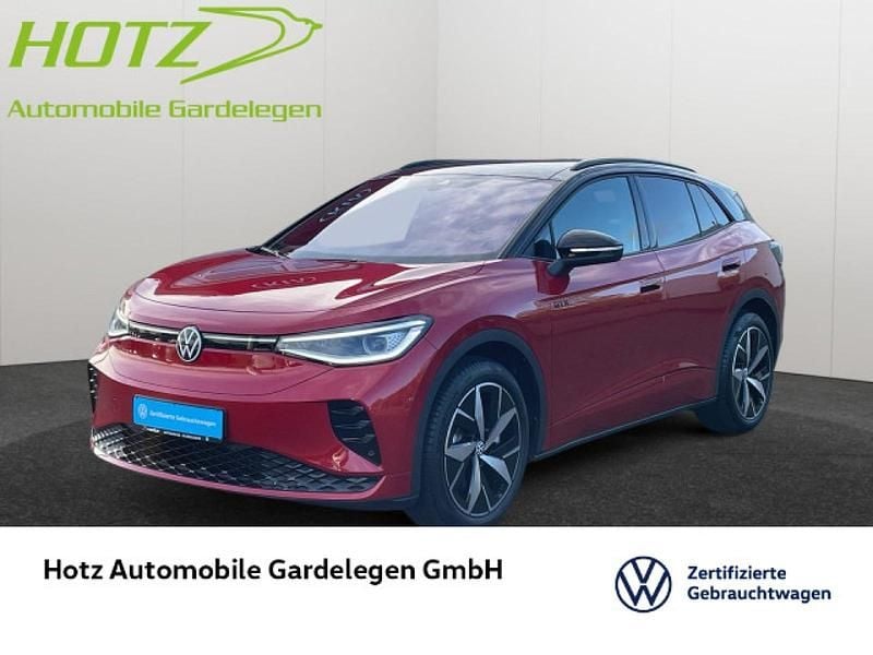Kings red metallic Gebraucht 2024 VW ID.4 GTX SUV | 42.490 € (Fairer Preis) - Bild 1/4