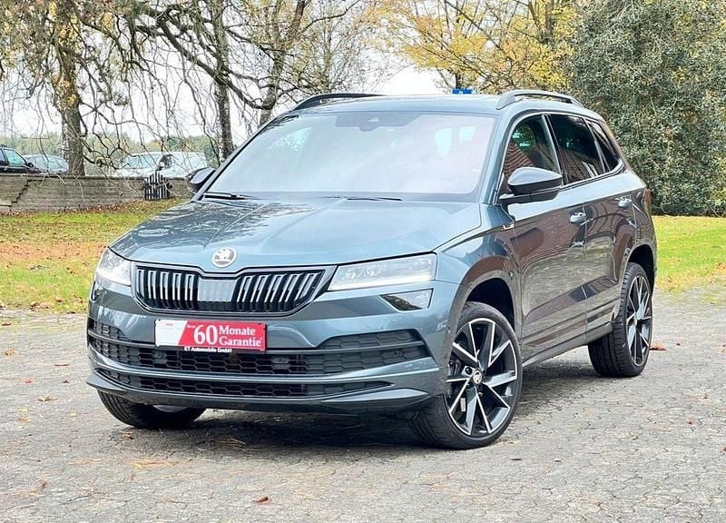 Grau Gebraucht 2020 Skoda Karoq SportLine SUV | 24.999 € (Fairer Preis) - Bild 1/4