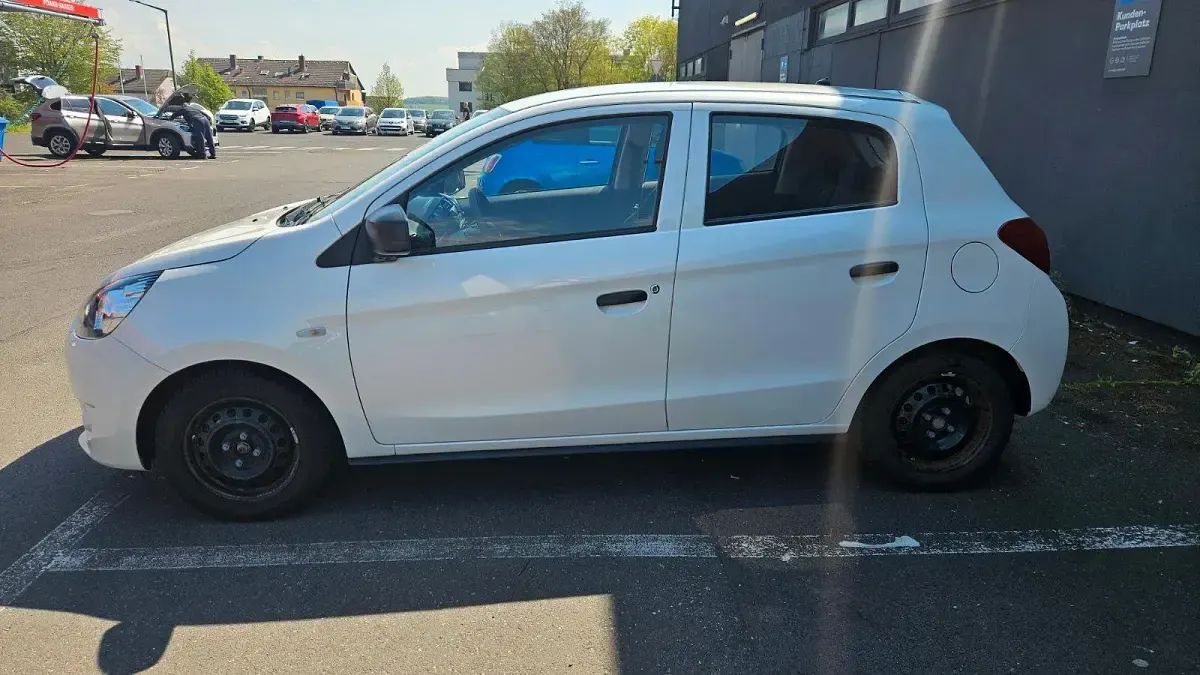 Gebraucht Mitsubishi Space Star 71 PS (52 kW) 2015 Weiß Kleinwagen