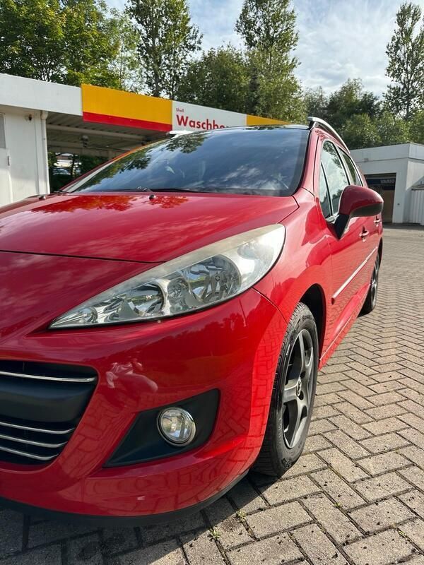 Rot Gebraucht 2009 Peugeot 207 Kombi | 2.300 € - Bild 1/4