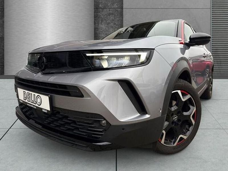 Gebraucht Opel Mokka 131 PS (96 kW) 2021 Kontrast grau/quarz silber SUV