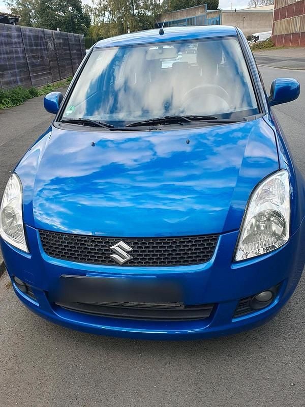 Blau Gebraucht 2009 Suzuki Swift Kleinwagen | 1.599 € (Fairer Preis) - Bild 1/4