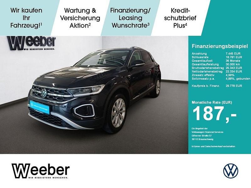 Deep black perleffekt (metallic) Gebraucht 2025 VW T-Roc Style SUV | 29.778 € (Fairer Preis) - Bild 1/4