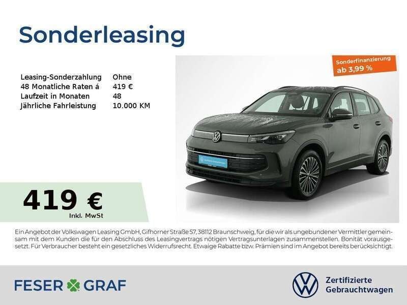 Cipressinogrün metallic Gebraucht 2024 VW Tiguan Life SUV | 36.206 € (Fairer Preis) - Bild 1/2