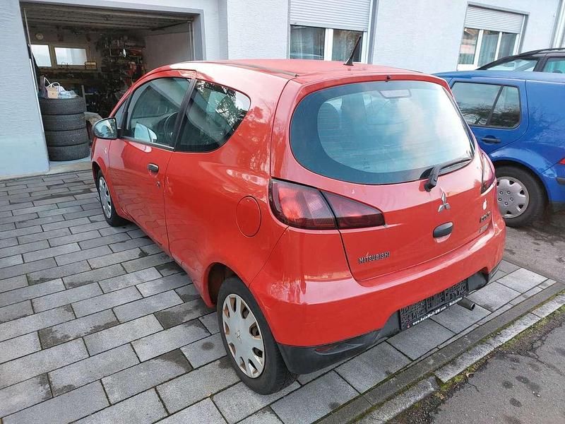 Gebraucht Mitsubishi Colt 75 PS (55 kW) 2009 Rot Kleinwagen