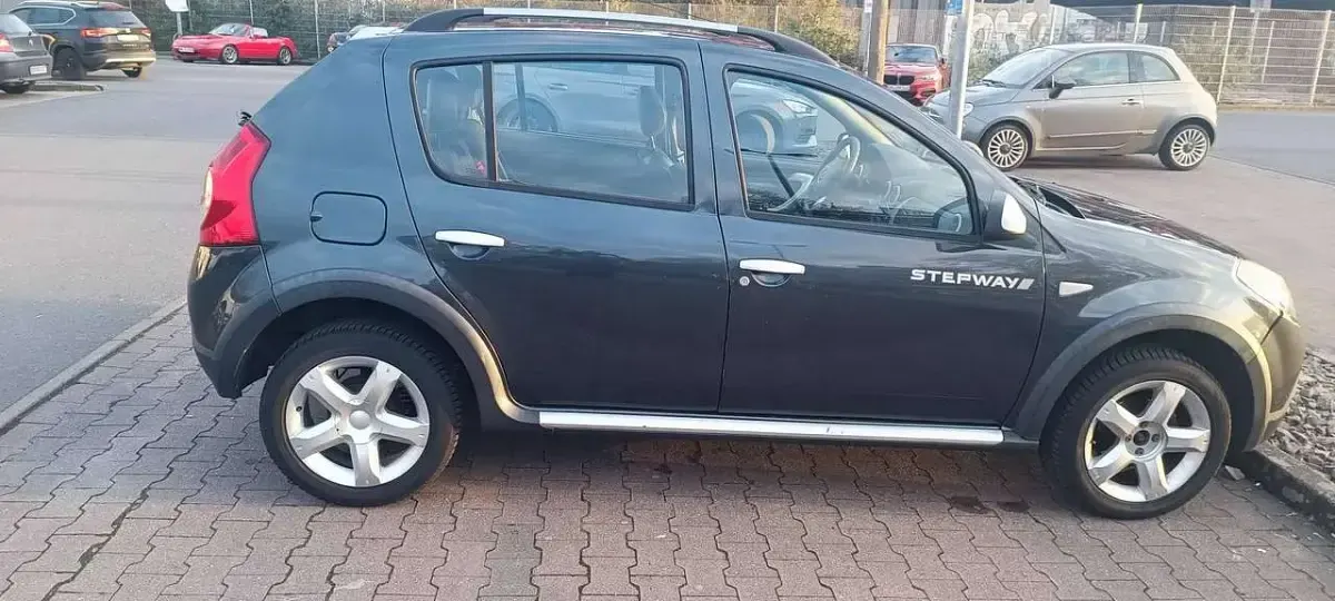 Gebraucht Dacia Sandero Stepway 84 PS (61 kW) 2012 Grau Kleinwagen