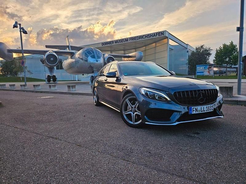 Grau Gebraucht 2015 Mercedes C220 AMG line Limousine | 17.999 € (Fairer Preis) - Bild 1/4