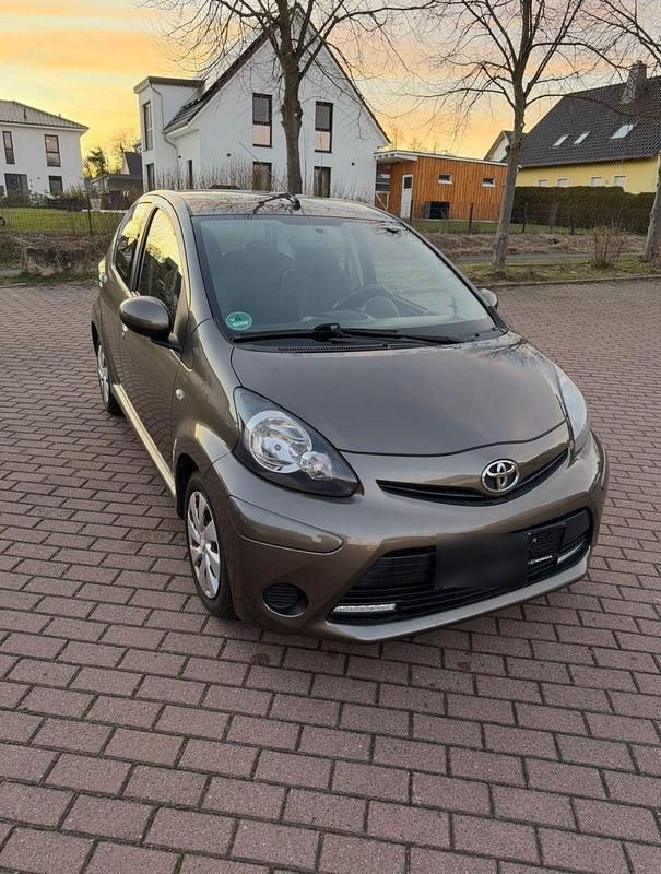 Gebraucht Toyota Aygo Cool 68 PS (50 kW) 2012 Braun Kleinwagen