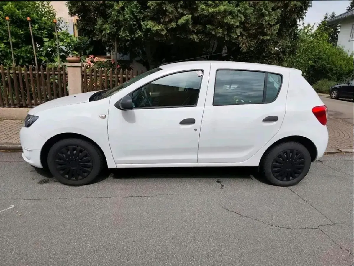 Gebraucht Dacia Sandero 75 PS (55 kW) 2014 Weiß Kleinwagen