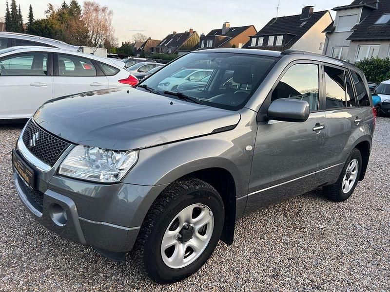Grau Gebraucht 2005 Suzuki Grand Vitara Comfort+ SUV | 5.499 € (Fairer Preis) - Bild 1/4
