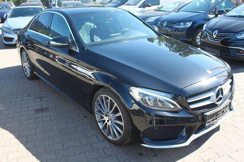 Obsidianschwarz metalliclack Gebraucht 2015 Mercedes C250 AMG line Limousine | 19.400 € (Guter Preis) - Bild 1/4