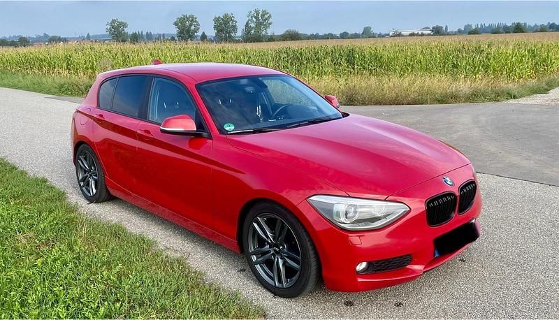 Rot Gebraucht 2013 BMW 118 Comfort Edition Kleinwagen | 6.100 € (Superpreis) - Bild 1/4