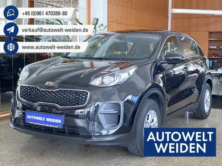 (1k) zilinaschwarz Gebraucht 2018 Kia Sportage Edition 7 SUV | 14.700 € (Fairer Preis) - Bild 1/4