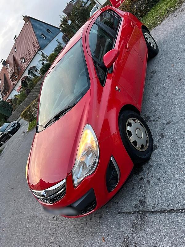 Gebraucht Opel Corsa 87 PS (63 kW) 2012 Rot Kleinwagen
