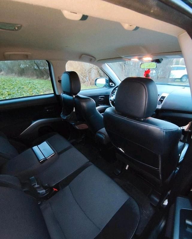 Gebraucht Mitsubishi Outlander Top 166 PS (122 kW) 2011 Schwarz SUV