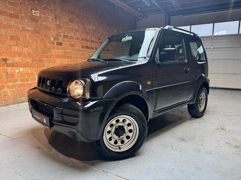 Schwarz Gebraucht 2012 Suzuki Jimny Club SUV | 14.250 € (Etwas zu teuer) - Bild 1/3