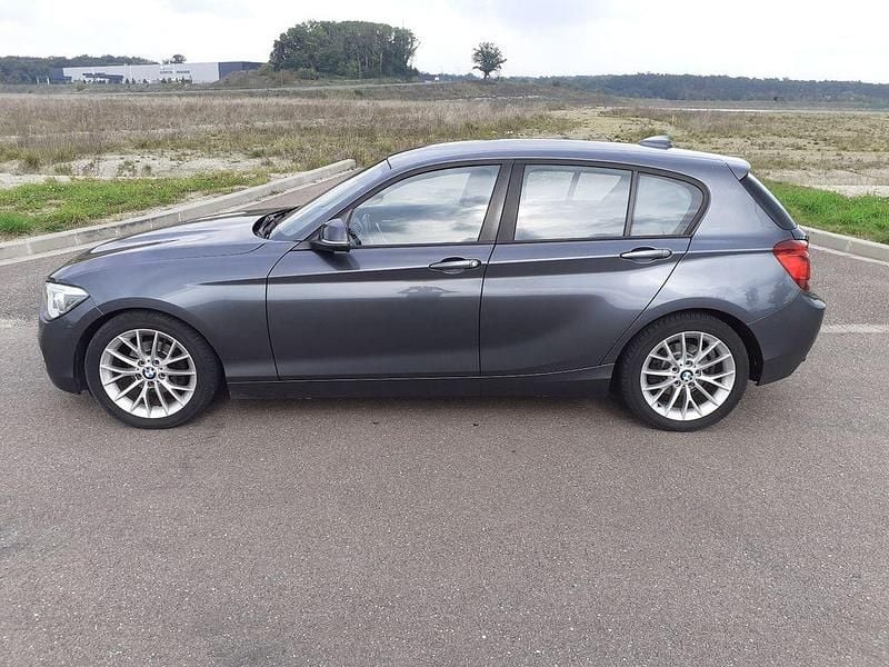 Grau Gebraucht 2011 BMW 116 Performance Kleinwagen | 7.650 € (Fairer Preis) - Bild 1/4