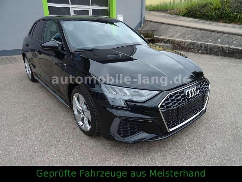Schwarz (mythosschwarz metallic) Gebraucht 2024 Audi A3 S-Line Limousine | 23.900 € (Superpreis) - Bild 1/4