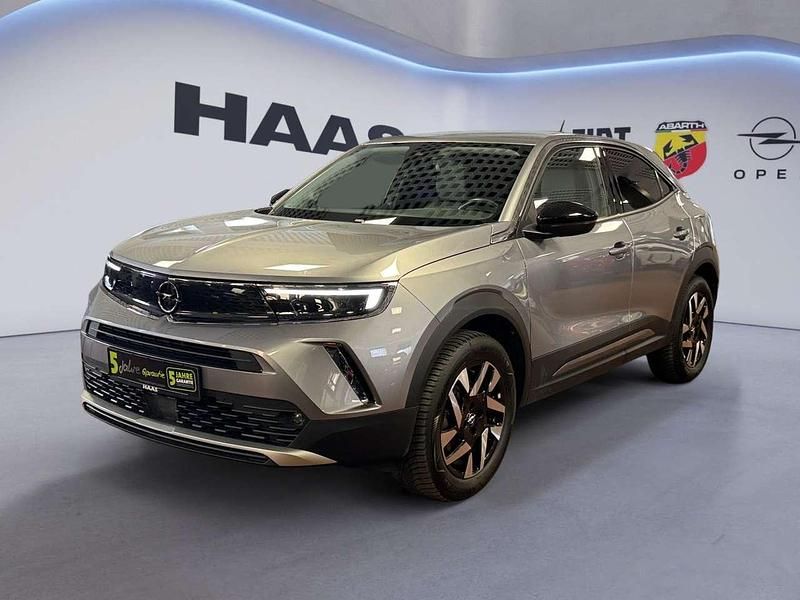 Gebraucht Opel Mokka-e Elegance 100 kW (136 PS) 2022 Quarz silber SUV