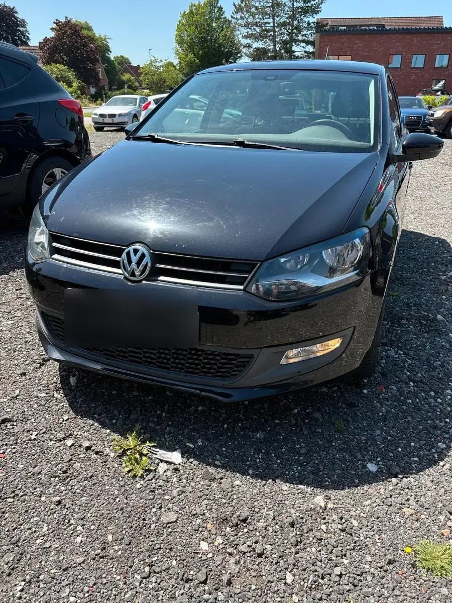 Gebraucht VW Polo Team 69 PS (50 kW) 2011 Schwarz Kleinwagen