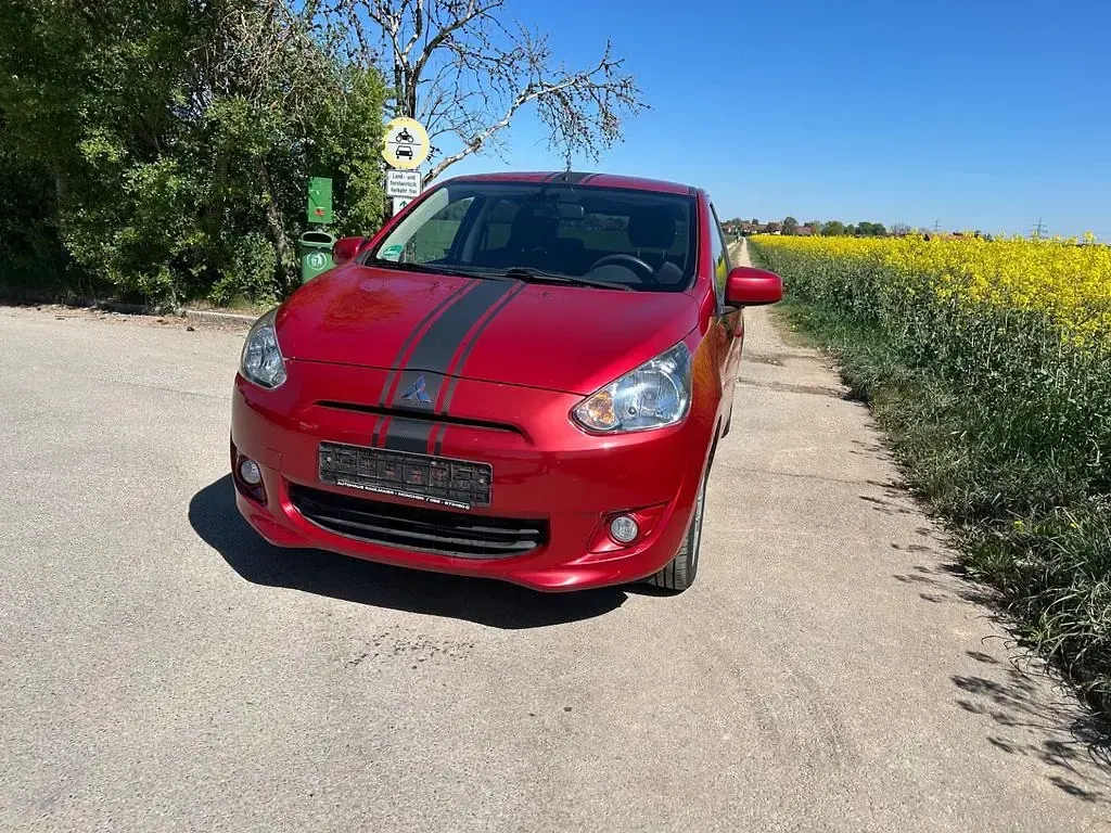 Gebraucht Mitsubishi Space Star 80 PS (58 kW) 2013 Rot Van / Kleinbus