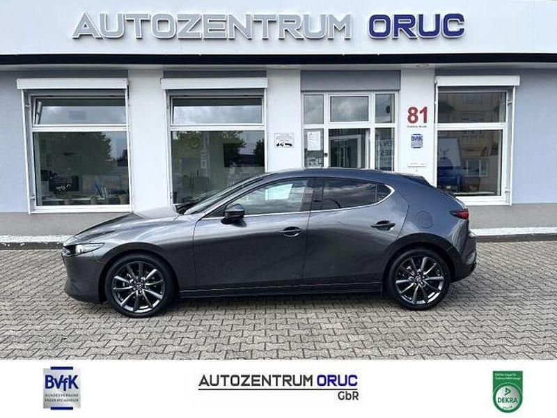 Machine grey Gebraucht 2020 Mazda 3 Selection Limousine | 17.980 € (Fairer Preis) - Bild 1/4